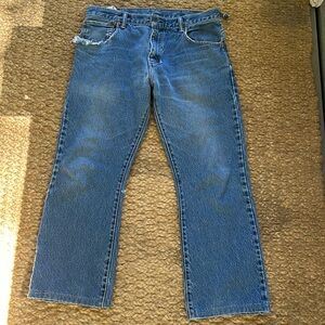 Worn in Levi’s 517 jeans